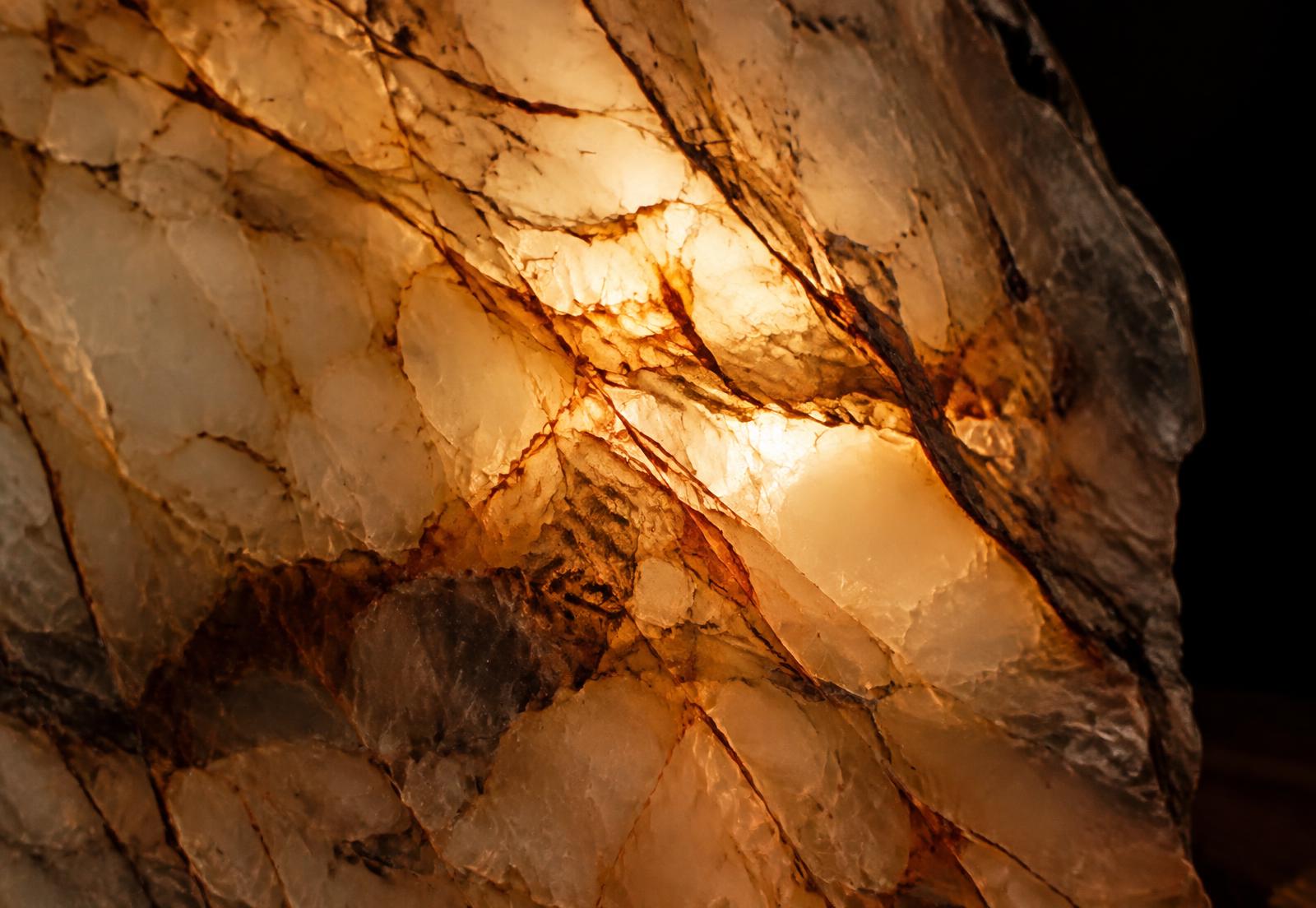 Backlit paper-thin marble with glowing translucent veining